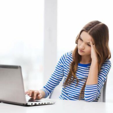 woman sad computer