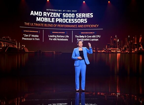 Lisa Su holding chip e1610517644592 Lisa Su holding chip e1610517644592